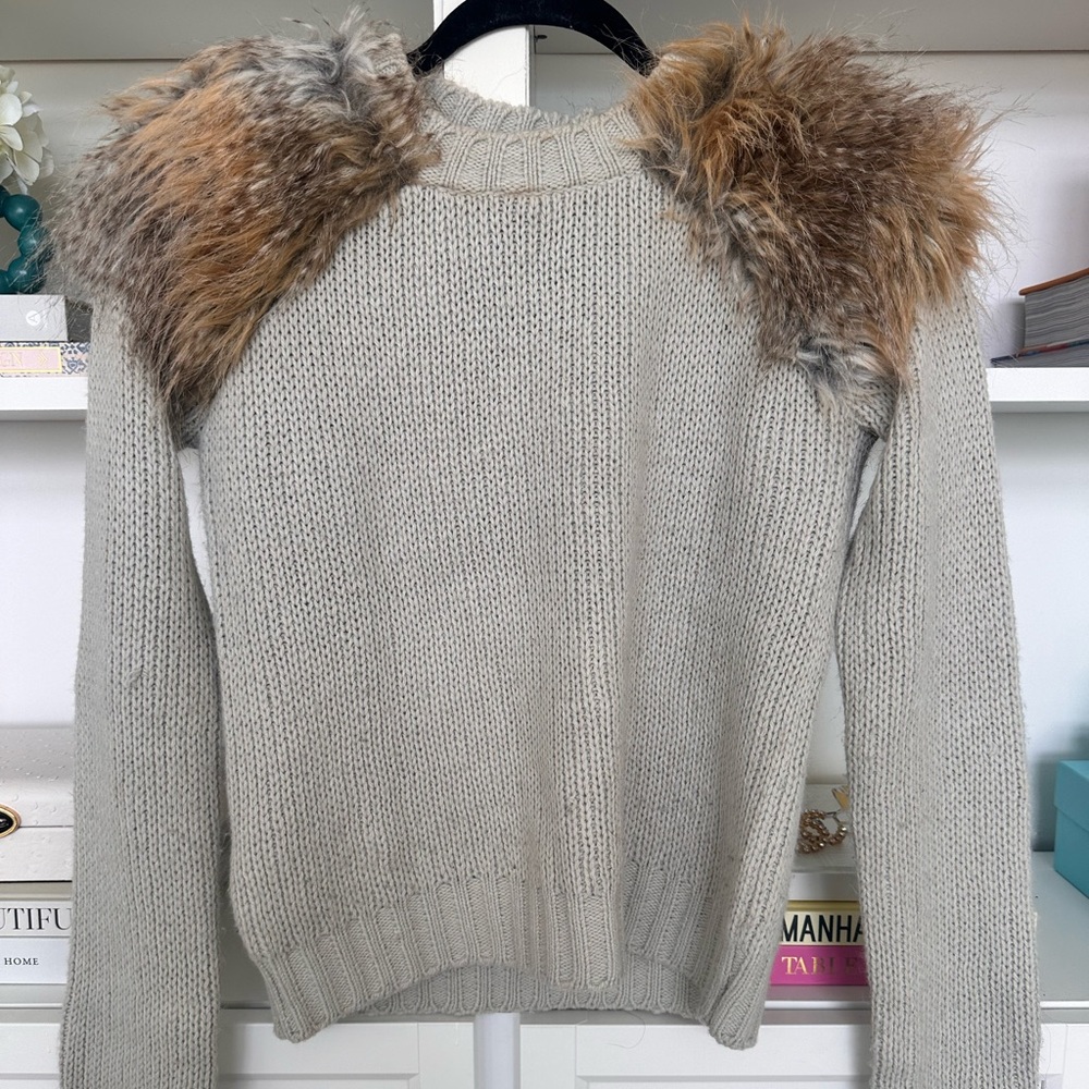 Feathered shoulder sweater